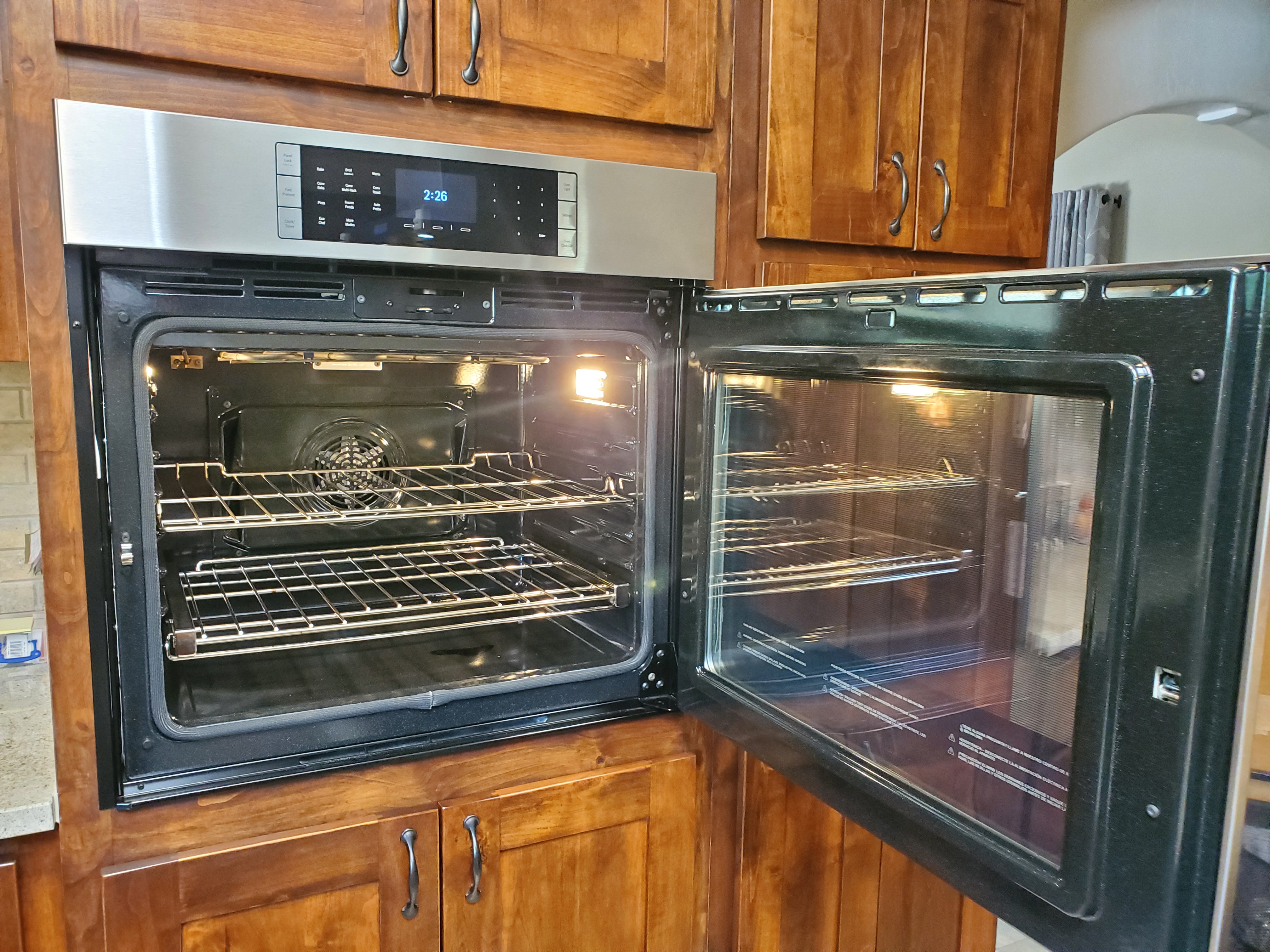 Detailed appliance repair work in progress